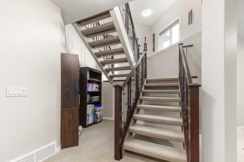 84 Aspen Summit Circle Sw, Calgary, AB - Indoor Photo Showing Other Room