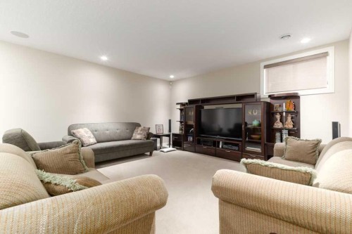 84 Aspen Summit Circle Sw, Calgary, AB - Indoor Photo Showing Living Room