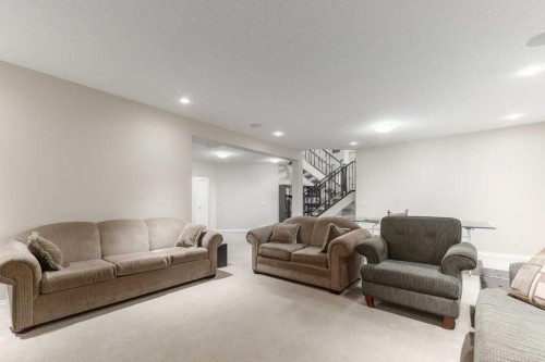 84 Aspen Summit Circle Sw, Calgary, AB - Indoor Photo Showing Living Room