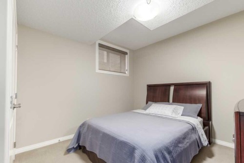 84 Aspen Summit Circle Sw, Calgary, AB - Indoor Photo Showing Bedroom