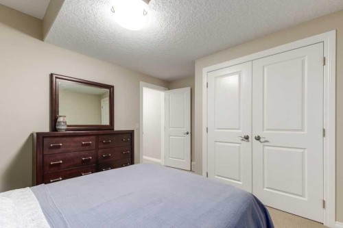 84 Aspen Summit Circle Sw, Calgary, AB - Indoor Photo Showing Bedroom