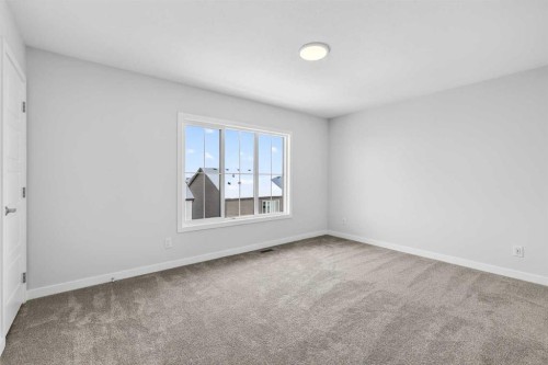 121-1750 Rangeview Drive Se, Calgary, AB - Indoor Photo Showing Other Room