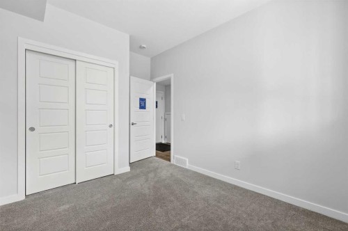 121-1750 Rangeview Drive Se, Calgary, AB - Indoor Photo Showing Other Room