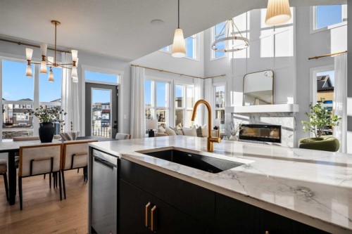 45 Wolf Hollow Common Se, Calgary, AB - Indoor Photo Showing Kitchen With Fireplace With Upgraded Kitchen