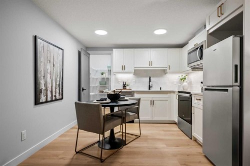 45 Wolf Hollow Common Se, Calgary, AB - Indoor Photo Showing Kitchen With Upgraded Kitchen