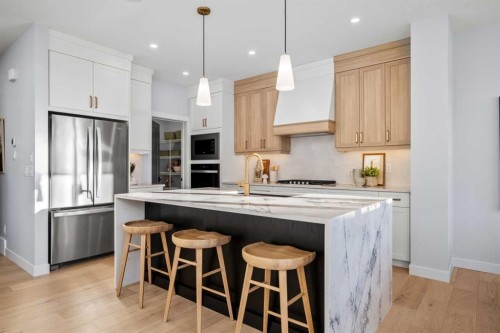 45 Wolf Hollow Common Se, Calgary, AB - Indoor Photo Showing Kitchen With Upgraded Kitchen