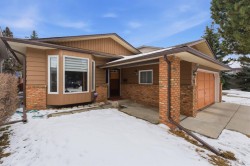 28 Woodstock Way SW Calgary, AB T2W 5X3