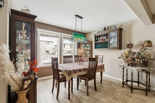23 Kingston View Se, Airdrie, AB - Indoor Photo Showing Dining Room