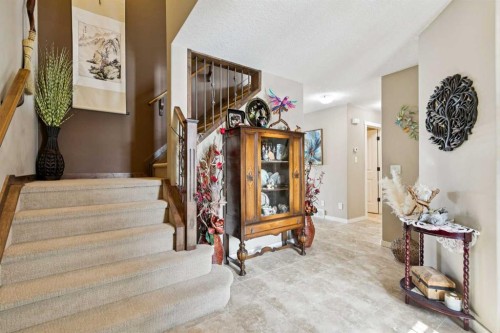 23 Kingston View Se, Airdrie, AB - Indoor Photo Showing Other Room