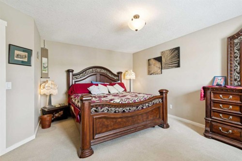 23 Kingston View Se, Airdrie, AB - Indoor Photo Showing Bedroom