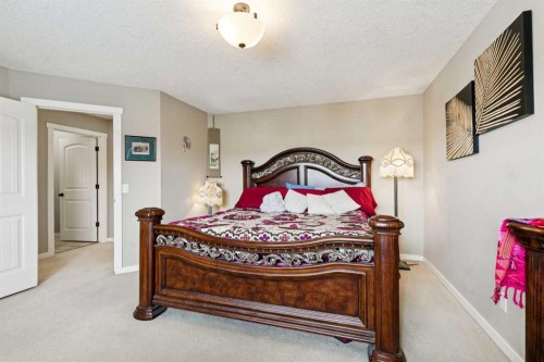 23 Kingston View Se, Airdrie, AB - Indoor Photo Showing Bedroom