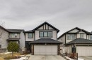 23 Kingston View Se, Airdrie, AB  - Outdoor With Facade 