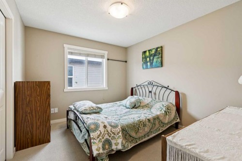 23 Kingston View Se, Airdrie, AB - Indoor Photo Showing Bedroom