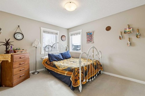 23 Kingston View Se, Airdrie, AB - Indoor Photo Showing Bedroom
