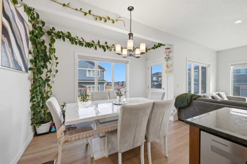 1448 Bayview Point Sw, Airdrie, AB - Indoor Photo Showing Dining Room