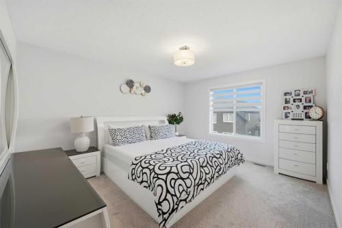 1448 Bayview Point Sw, Airdrie, AB - Indoor Photo Showing Bedroom