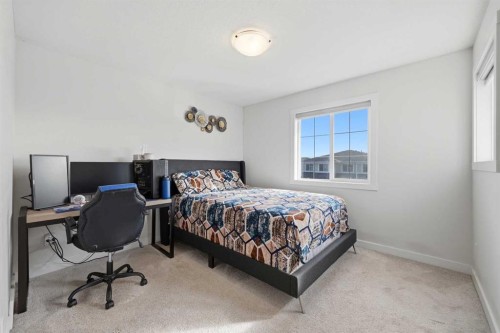 1448 Bayview Point Sw, Airdrie, AB - Indoor Photo Showing Bedroom