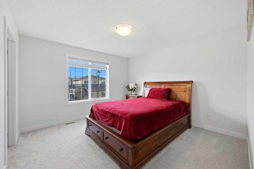 1448 Bayview Point Sw, Airdrie, AB - Indoor Photo Showing Bedroom
