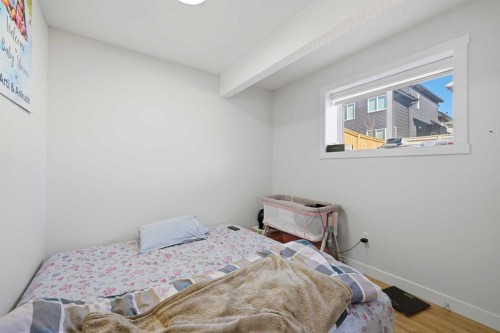 1448 Bayview Point Sw, Airdrie, AB - Indoor Photo Showing Bedroom