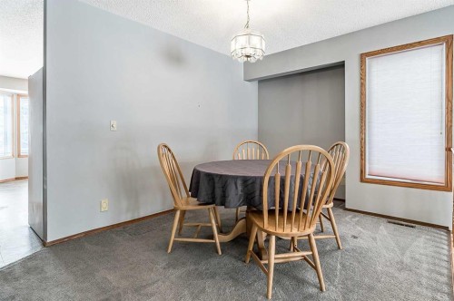 104 Macewan Meadow Way Nw, Calgary, AB - Indoor Photo Showing Dining Room
