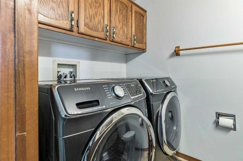 104 Macewan Meadow Way Nw, Calgary, AB - Indoor Photo Showing Laundry Room