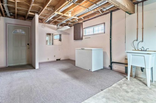 104 Macewan Meadow Way Nw, Calgary, AB - Indoor Photo Showing Basement