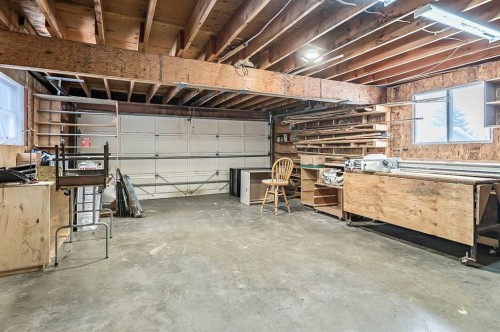 104 Macewan Meadow Way Nw, Calgary, AB - Indoor Photo Showing Garage