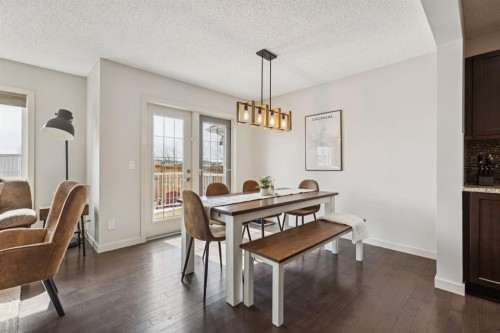 298 River Heights Crescent, Cochrane, AB - Indoor Photo Showing Dining Room
