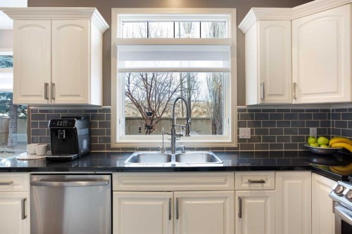 90 Discovery Ridge Road Sw, Calgary, AB - Indoor Photo Showing Kitchen With Double Sink