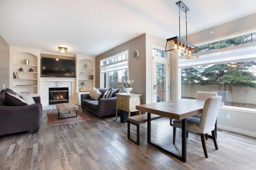 90 Discovery Ridge Road Sw, Calgary, AB - Indoor Photo Showing Living Room With Fireplace
