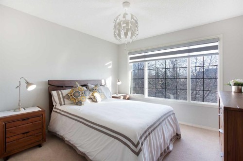 90 Discovery Ridge Road Sw, Calgary, AB - Indoor Photo Showing Bedroom