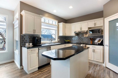 90 Discovery Ridge Road Sw, Calgary, AB - Indoor Photo Showing Kitchen With Double Sink
