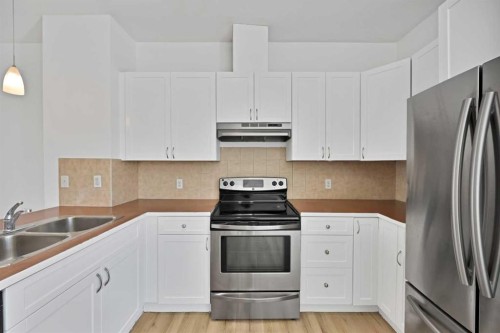 3503-111 Tarawood Lane Ne, Calgary, AB - Indoor Photo Showing Kitchen With Double Sink