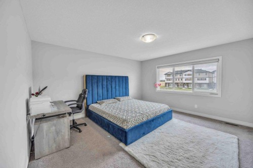 184 Cornerbrook Common Ne, Calgary, AB - Indoor Photo Showing Bedroom