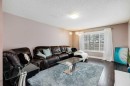 935 Windhaven Close Sw, Airdrie, AB  - Indoor Photo Showing Living Room 