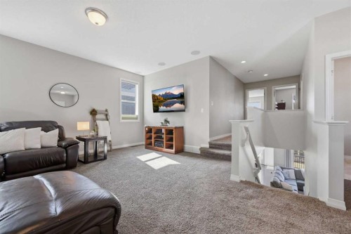 344 Sunset View, Cochrane, AB - Indoor Photo Showing Living Room