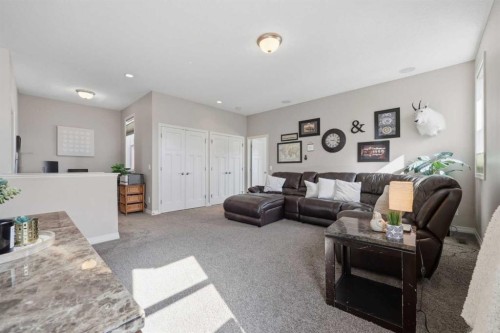 344 Sunset View, Cochrane, AB - Indoor Photo Showing Living Room