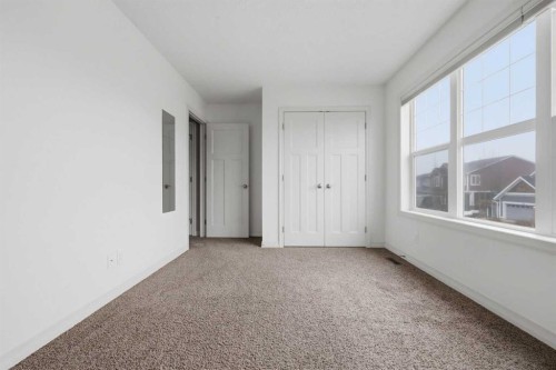 344 Sunset View, Cochrane, AB - Indoor Photo Showing Other Room