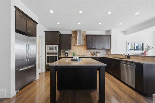 344 Sunset View, Cochrane, AB - Indoor Photo Showing Kitchen With Stainless Steel Kitchen With Upgraded Kitchen
