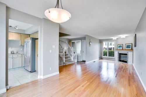 219 Coachway Lane Sw, Calgary, AB - Indoor With Fireplace