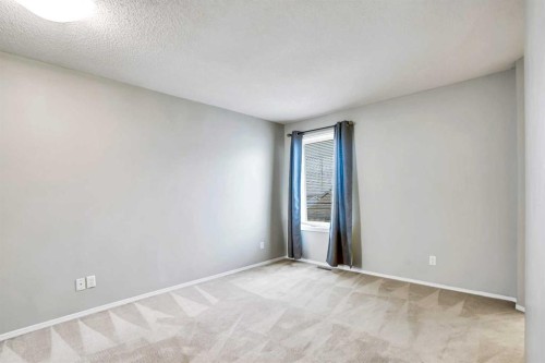 219 Coachway Lane Sw, Calgary, AB - Indoor Photo Showing Other Room