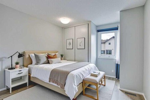 219 Coachway Lane Sw, Calgary, AB - Indoor Photo Showing Bedroom