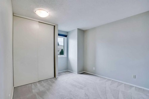 219 Coachway Lane Sw, Calgary, AB - Indoor Photo Showing Other Room