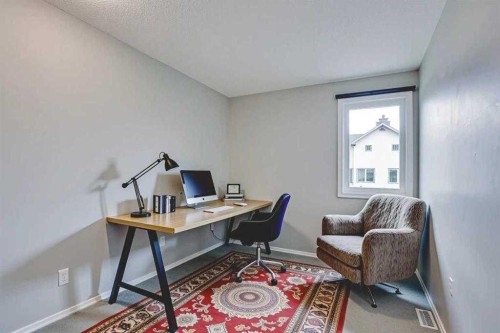 219 Coachway Lane Sw, Calgary, AB - Indoor Photo Showing Office