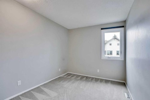 219 Coachway Lane Sw, Calgary, AB - Indoor Photo Showing Other Room