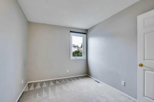 219 Coachway Lane Sw, Calgary, AB - Indoor Photo Showing Other Room