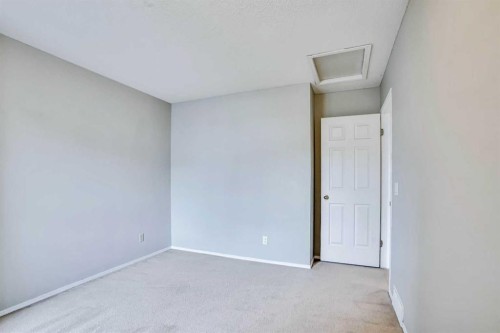 219 Coachway Lane Sw, Calgary, AB - Indoor Photo Showing Other Room