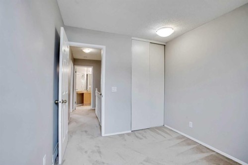 219 Coachway Lane Sw, Calgary, AB - Indoor Photo Showing Other Room