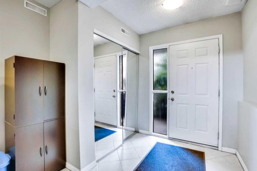 219 Coachway Lane Sw, Calgary, AB - Indoor Photo Showing Other Room