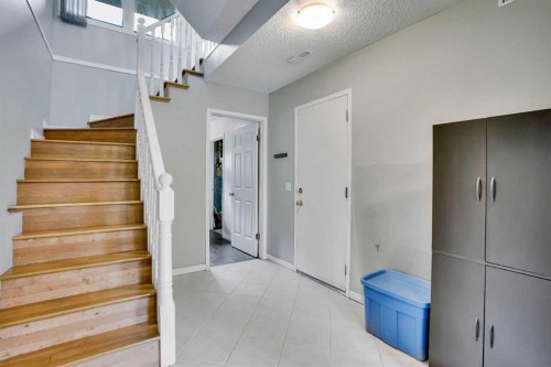 219 Coachway Lane Sw, Calgary, AB - Indoor Photo Showing Other Room